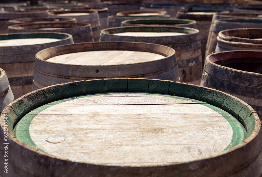 Fototapeta premium Barrels of wine in wood. Texture