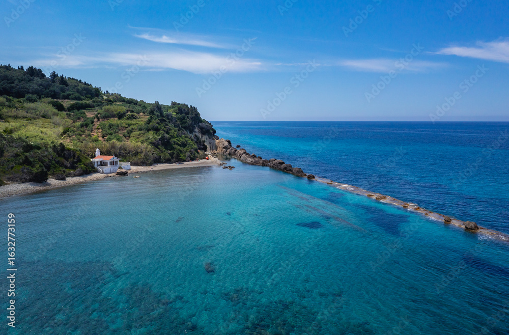 Fototapeta premium Aerial drone view with Agios Nikolaos chapel in Meliteieis region of Cordu Island, Greece