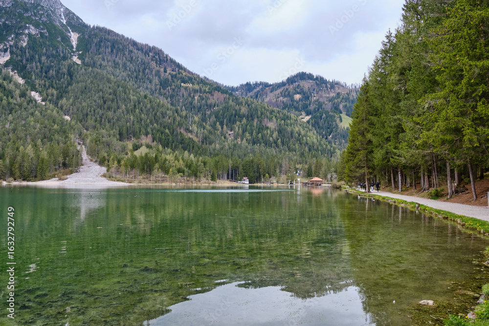 March 2025: Lake Dobbiaco (Toblacher See, Lago di Dobbiaco) in Dolomite Alps, South Tirol, Italy - Travel destination in Europe March 2025: Lake Dobbiaco (Toblacher See, Lago di Dobbiaco) in Dolomite Alps, South Tirol, Italy - Travel destination in Europe