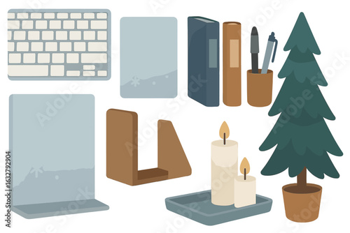 Decorative office supplies and a small Christmas tree enhancing a cozy workspace atmosphere during the holiday season