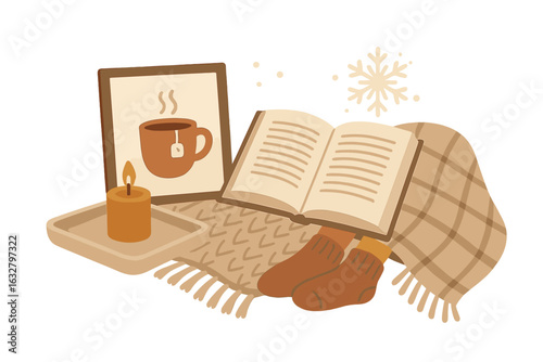 Cozy indoor setup with a book, tea, and candle during winter afternoon relaxation