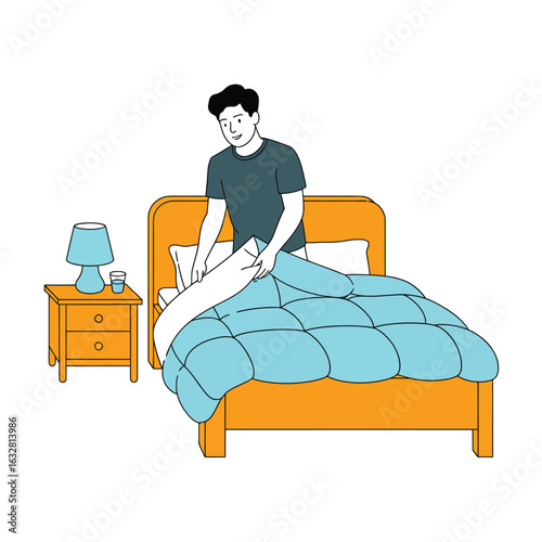 Young man making his bed in the morning after waking up