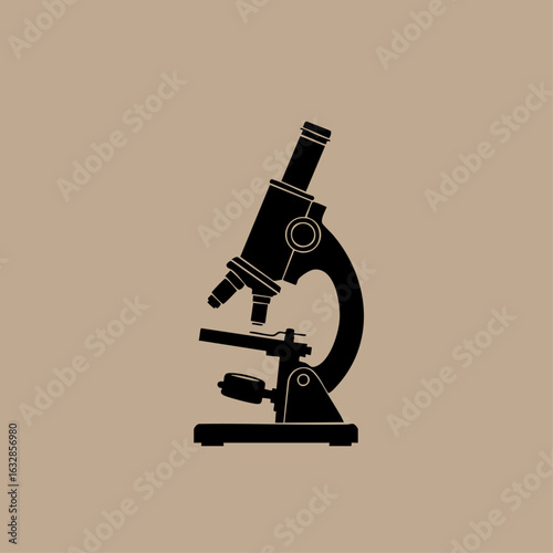 Black microscope on tan background representing study of microorganisms. Microscope aids scientific discovery and research in laboratory settings, offering detailed view of biological samples.