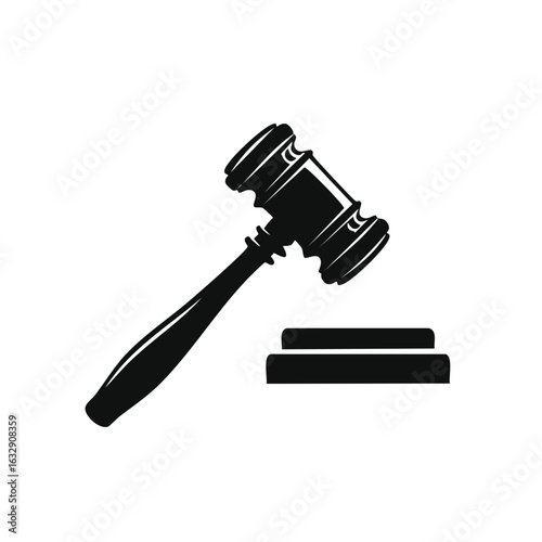 Black silhouette of a judge gavel and sound block representing justice law and court decisions