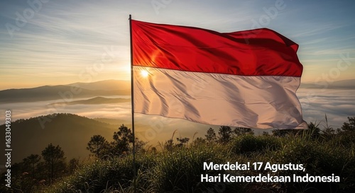 National flag waving over sunrise mountains