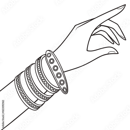 Elegant female hand adorned with multiple patterned bangles, showcasing intricate designs.