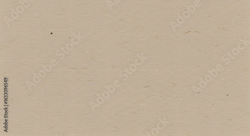 Warm light brown paper texture with subtle speckles, ideal as a minimalist and organic background.