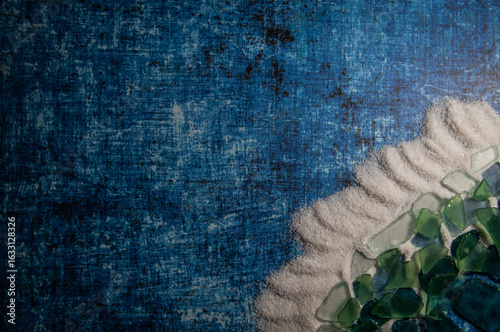 studio beach front with sea glass and decorative white sand
