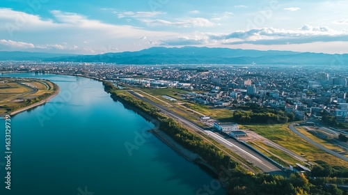 Wallpaper Mural Aerial view of city, river, and airport Torontodigital.ca
