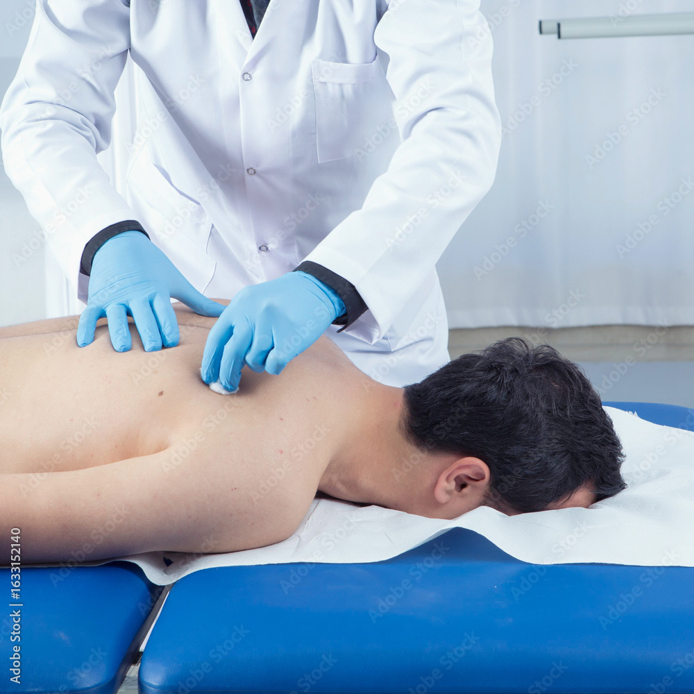 Fototapeta premium Original name(s): Modern Physiotherapy Clinic with Medical Team – Therapist Assisting Patient and Doctor Performing Examination,Rehabilitation Clinic Scene – Physiotherapist, Doctor, and Medical Assis