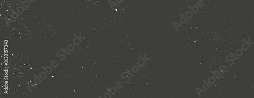 Dark gray background with a speckled texture, resembling a starry night. The gray background adds a cosmic, mysterious feel. Speckled wall texture background. Black background vector.