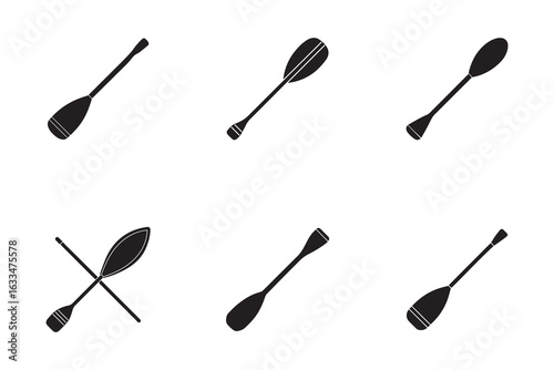 Set of simple black paddles on a white background representing canoeing kayaking rafting water sports and recreational outdoor activities equipment vector illustration