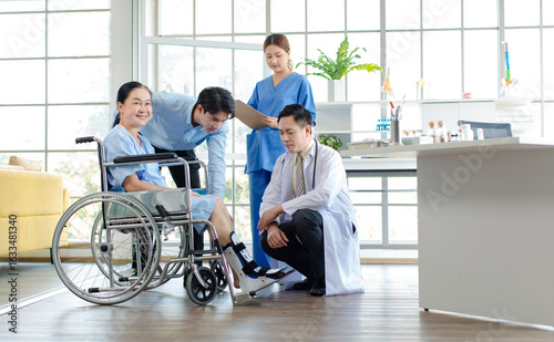 Asian doctor physiotherapy check splint leg support to senior old woman patient assisted by caregiver and nurse medical orthopedic trauma treatment team providing rehabilitation in a healthcare clinic