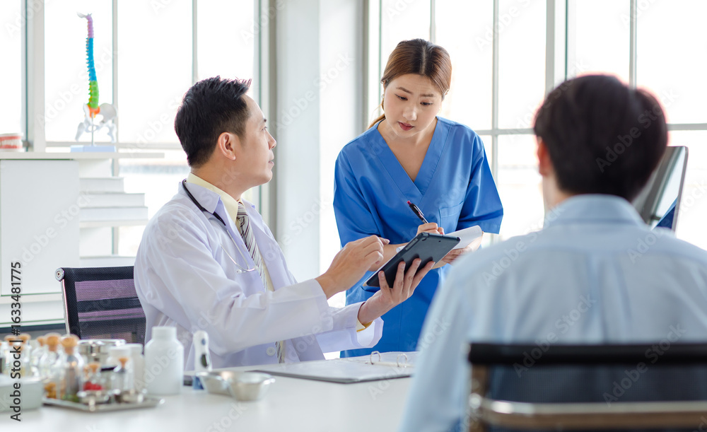 Obraz premium Asian male doctor consulting explaining talking medications to patient sick assisted by caregiver nurse professional support trust healthcare checkup insurance treatment wellness in hospital clinic.