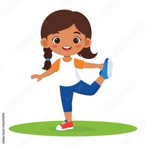 A young girl happily balances in a yoga pose on a green surface.