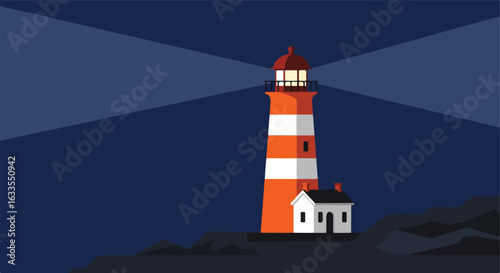 Lit striped lighthouse & house under a dark sky