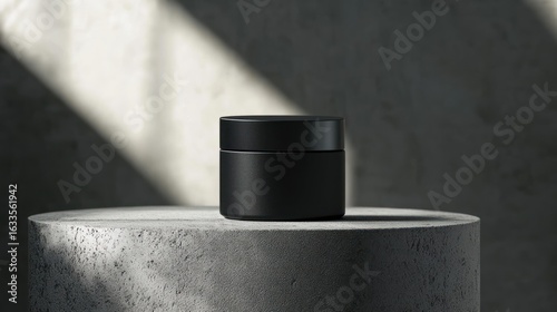 Matte black cosmetic jar on a round concrete podium, bathed in sunlight