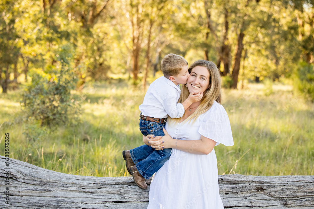 Naklejka premium Mother and son portrait in rural Australian bush setting