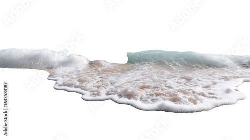 Coastal Serenity: A picturesque portrayal of the ocean meeting the shore, with foamy waves gently caressing the sandy terrain. Capturing the essence of nature's dance, offering a tranquil vista.