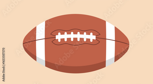 Brown American football with white stripes and laces, on peach background