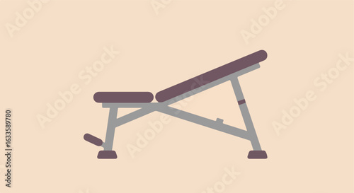 Inclined workout bench on tan background