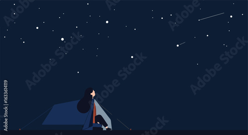 Camper gazing at the starry night sky from inside a tent