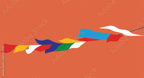 Colorful prayer flags strung against a salmon background