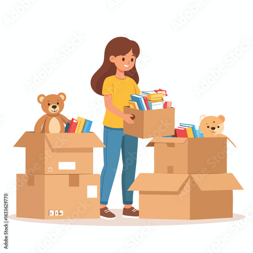 A woman packing books and toys into cardboard boxes, preparing to move.