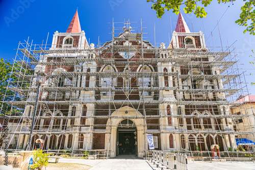 an old church covered in scaffolding