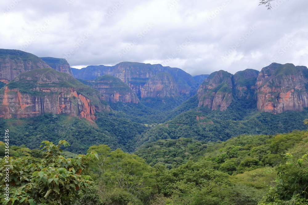 Fototapeta premium Majestic view of Amboro National Park in Bolivia with aerial perspective over the rainforest mountains and valleys