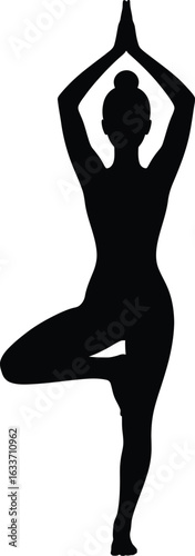 Silhouette of woman in yoga tree pose vrikshasana