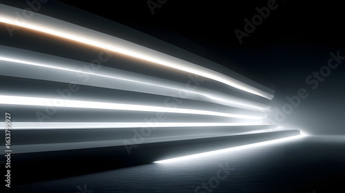 Abstract image showing light trails in a dark space creating a sense of movement.