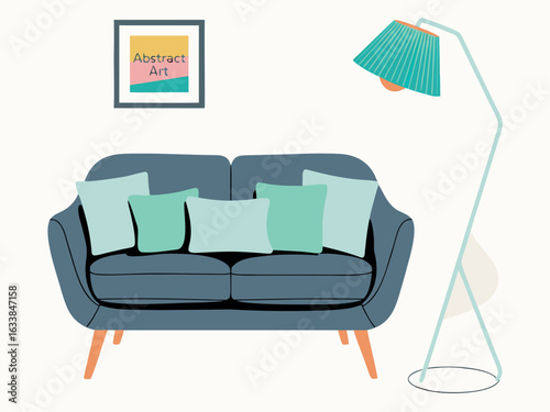 Blue sofa with colorful pillows and a floor lamp with abstract art on wall couch furniture