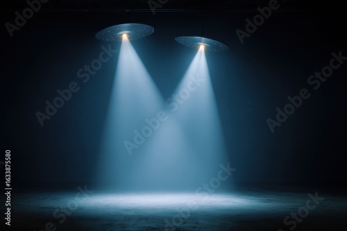 Two UFOs illuminate dark stage