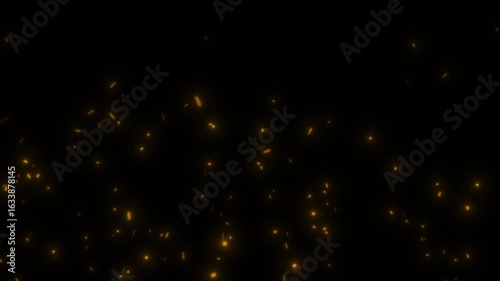 Flying fiery sparks on black background. Perfect for fire effects, explosions, welding, and dynamic video overlays