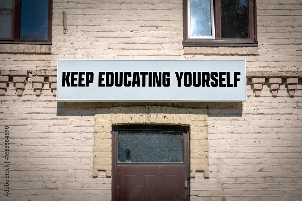 Fototapeta premium Motivational Message Keep Educating Yourself on Wall