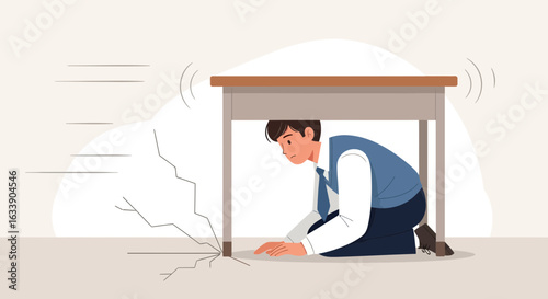 Man Hides Under A Desk To Protect Himself During An Earthquake Tremor