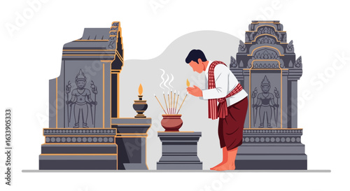 Man Offering Incense Sticks In Front Of A Traditional Cambodian Temple