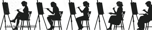 Silhouette of artists painting on easels, creative art class, artistic expression, drawing workshop, painters at work, art studio scene