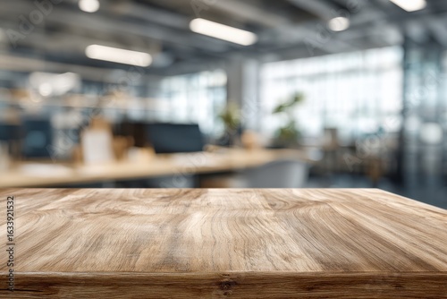Wooden table top, out of focus office background