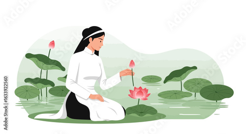 Vietnamese Woman In Ao Dai Touching A Lotus Flower On A Tranquil Lake