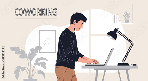 Young Professional At Coworking Space Working On Laptop In Comfortable Environment