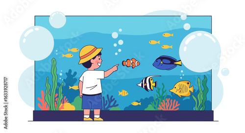Young Enthusiast Watching Diverse Fish Collection In Large Aquarium Tank