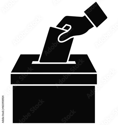 Hand dropping ballot into voting box vote election