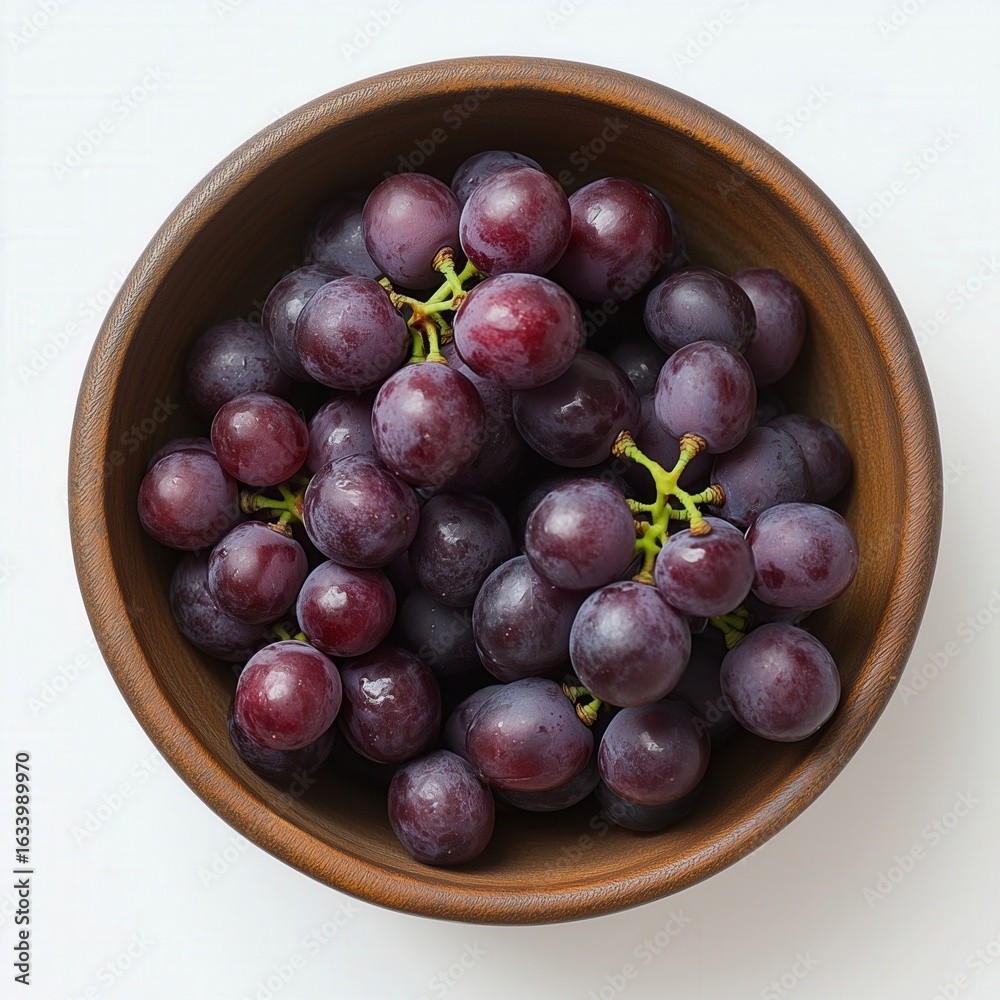Fototapeta premium Studio Shot: Lush Red Grapes in Rustic Wooden Bowl; Food, Drink, & Health Designs