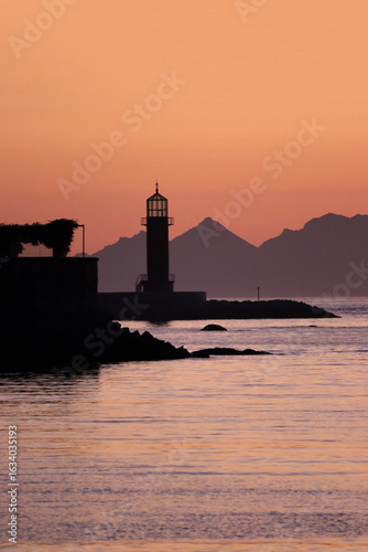 Wallpaper Mural Vigo Lighthouse with the Cies Islands in the background at sunset Torontodigital.ca