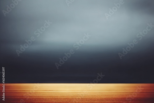 Blurred moody sky over a wooden floor