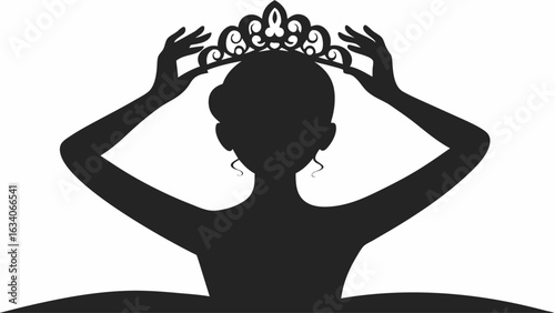 Silhouette of a woman placing a decorative crown on her head with both hands in a graceful gesture