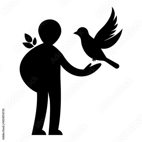 Person releasing a bird silhouette