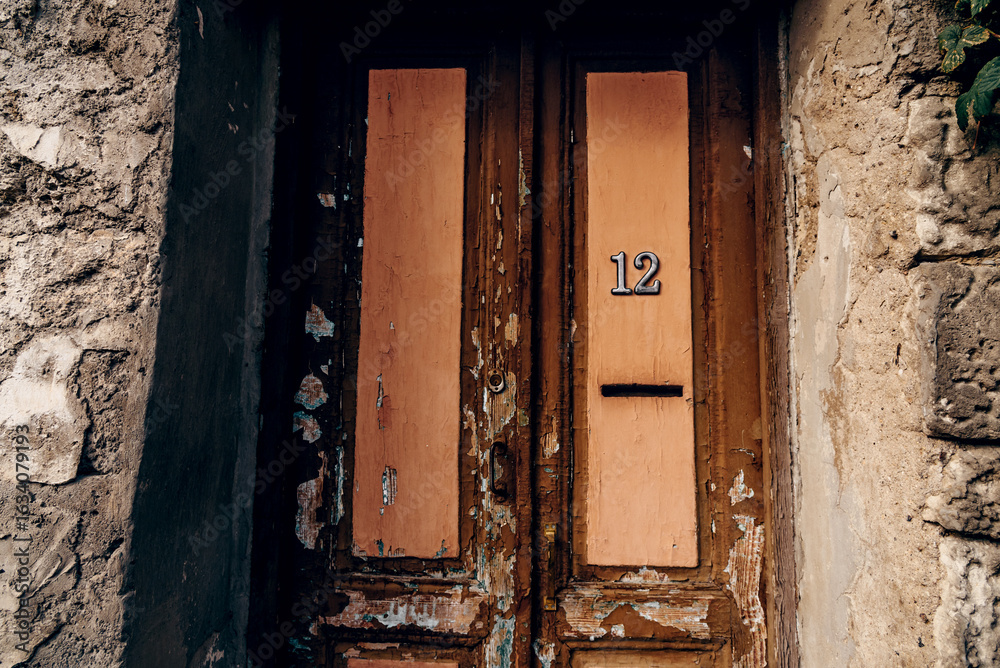 Entrance door small residential house in neighborhood, exterior building outside Entrance door small residential house in neighborhood, exterior building outside